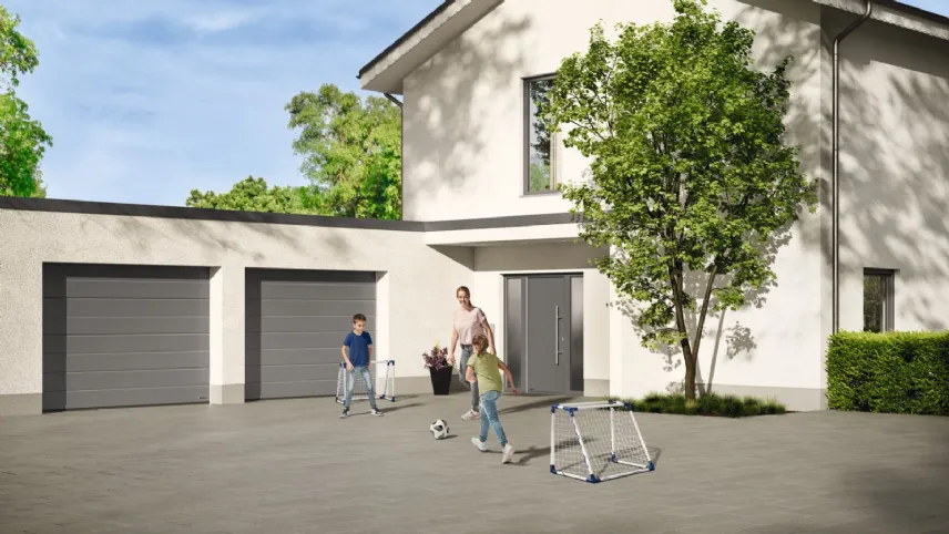Portone sezionale RenoMatic e porta d'ingresso Thermo65 di Hörmann 